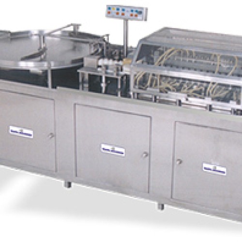 Linear vial washing machine